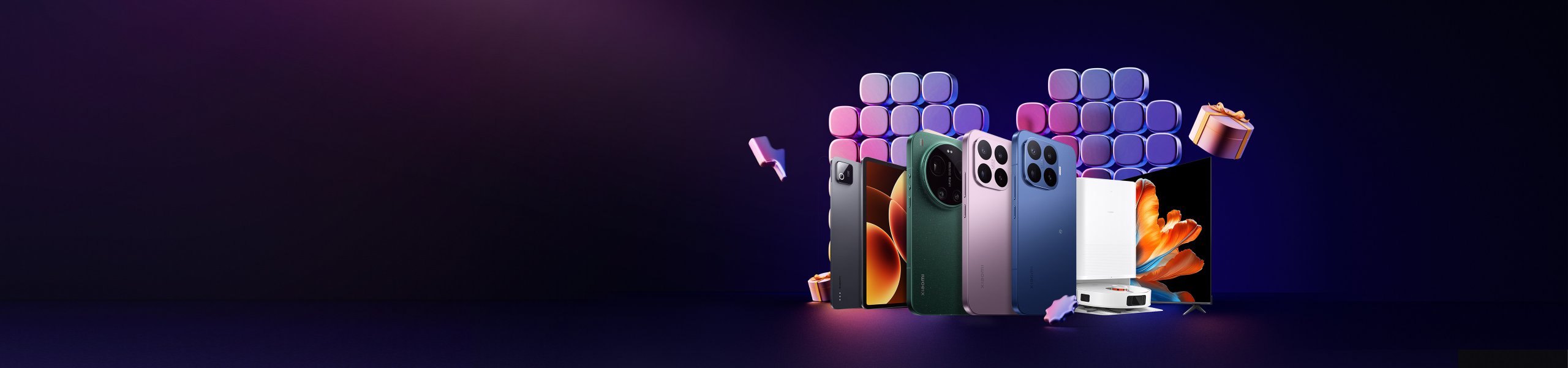 Xiaomiの製品プロモーション、分割払いは最長36回まで可能です。テレビ、スマートフォン、その他のデバイスを含む多くのXiaomi電子製品が展示されており、背景は紫のグラデーションです。