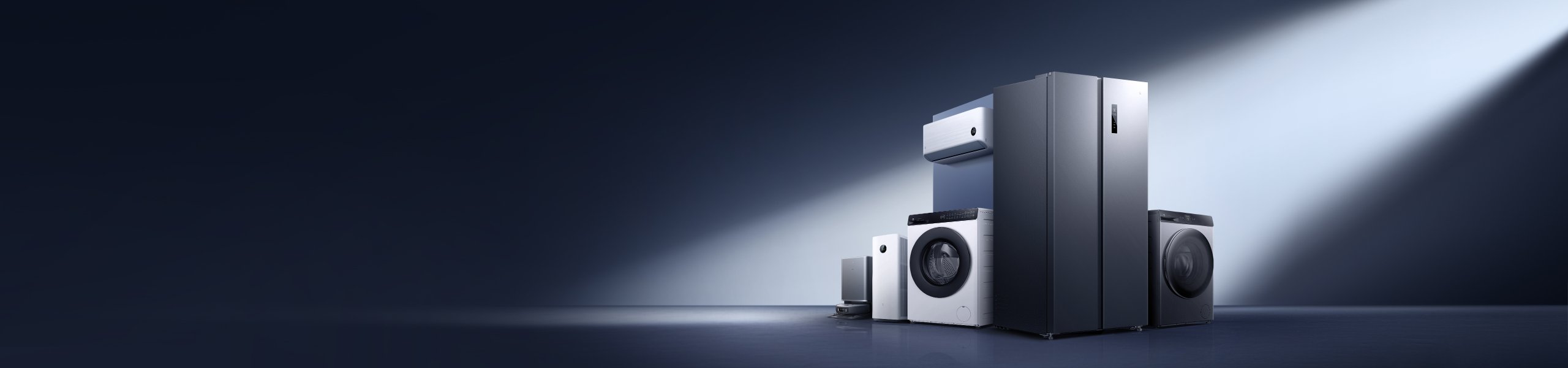 A display of modern household appliances, including a washing machine, refrigerator, air purifier, smart robotic vacuum cleaner, and air fryer, with a background of soft gradient colors.