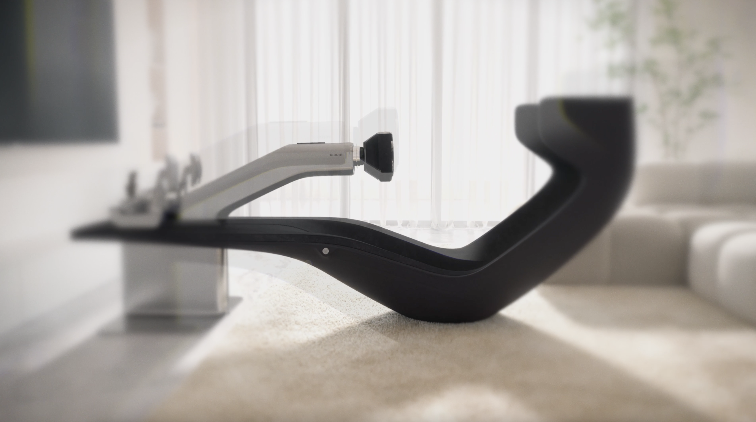 A modern massage chair, designed with streamlined lines, equipped with adjustable massage devices, situated in a bright indoor environment with curtains and a sofa in the background.