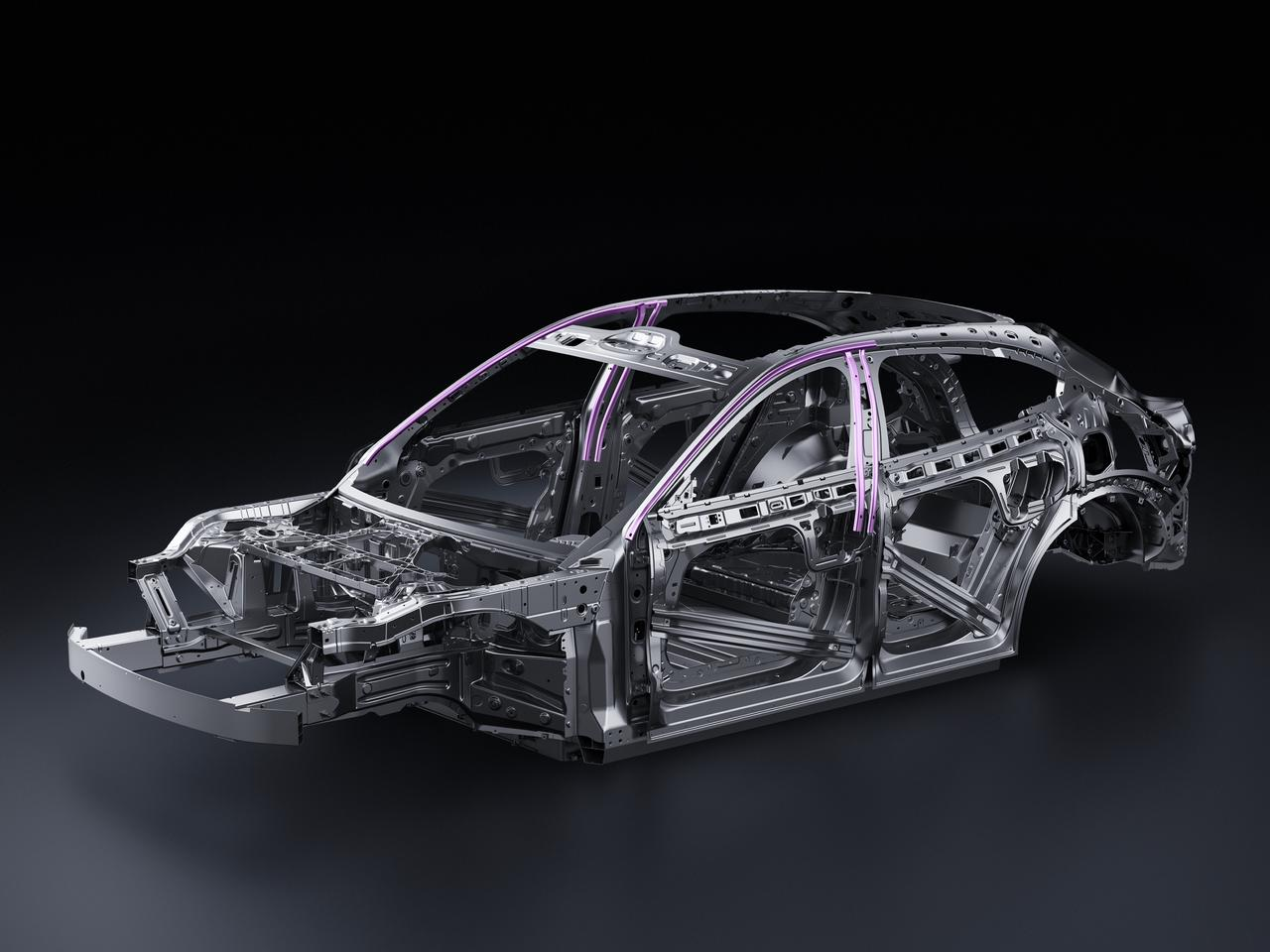 Il telaio metallico dell'auto è mostrato su uno sfondo nero, con una struttura complessa e alcune aree evidenziate in viola.