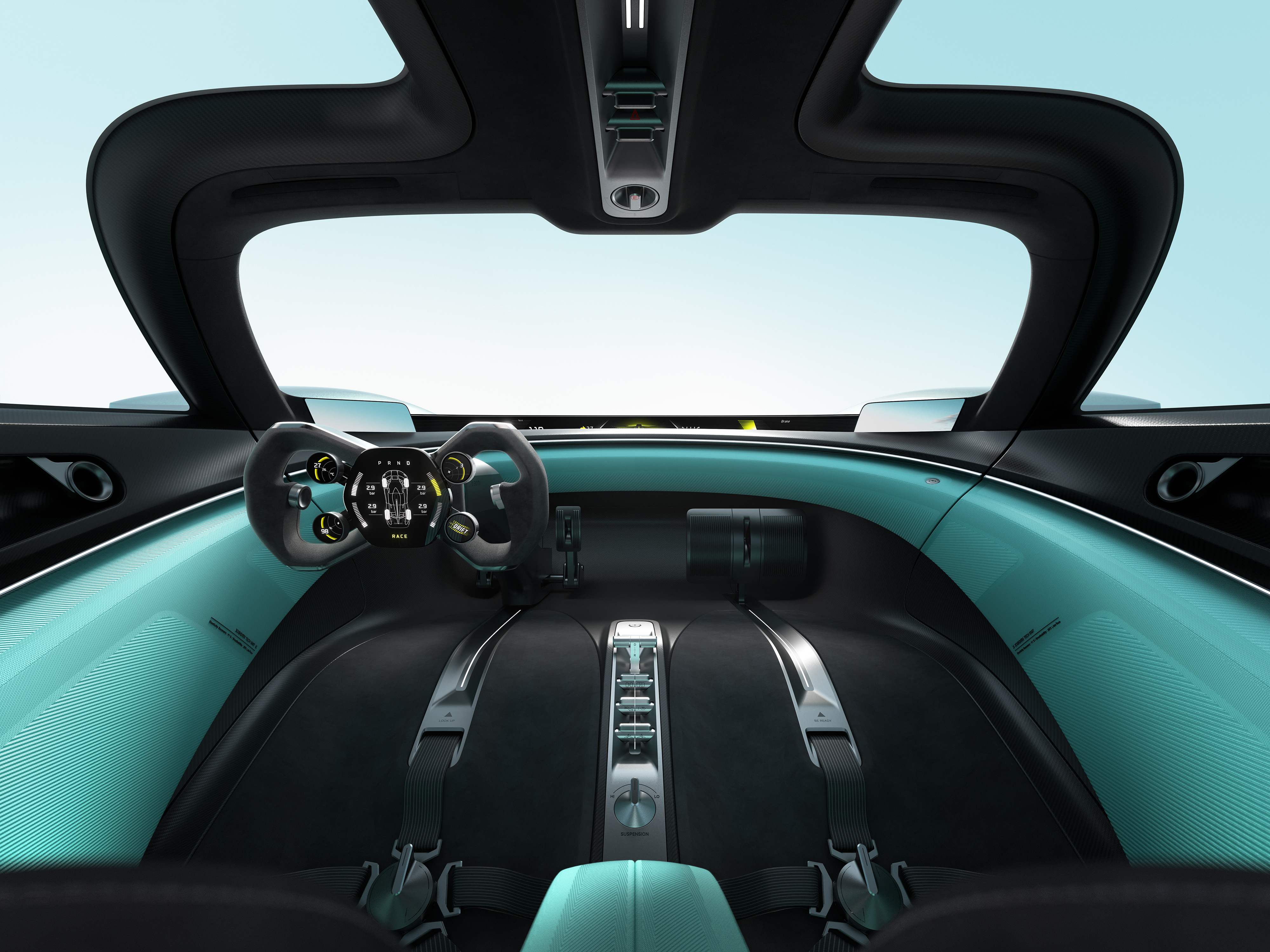 The interior perspective showcases a modern design steering wheel and dashboard, with seats equipped with seat belts. The interior predominantly features a teal and black color scheme, and the overall design is simple yet futuristic.