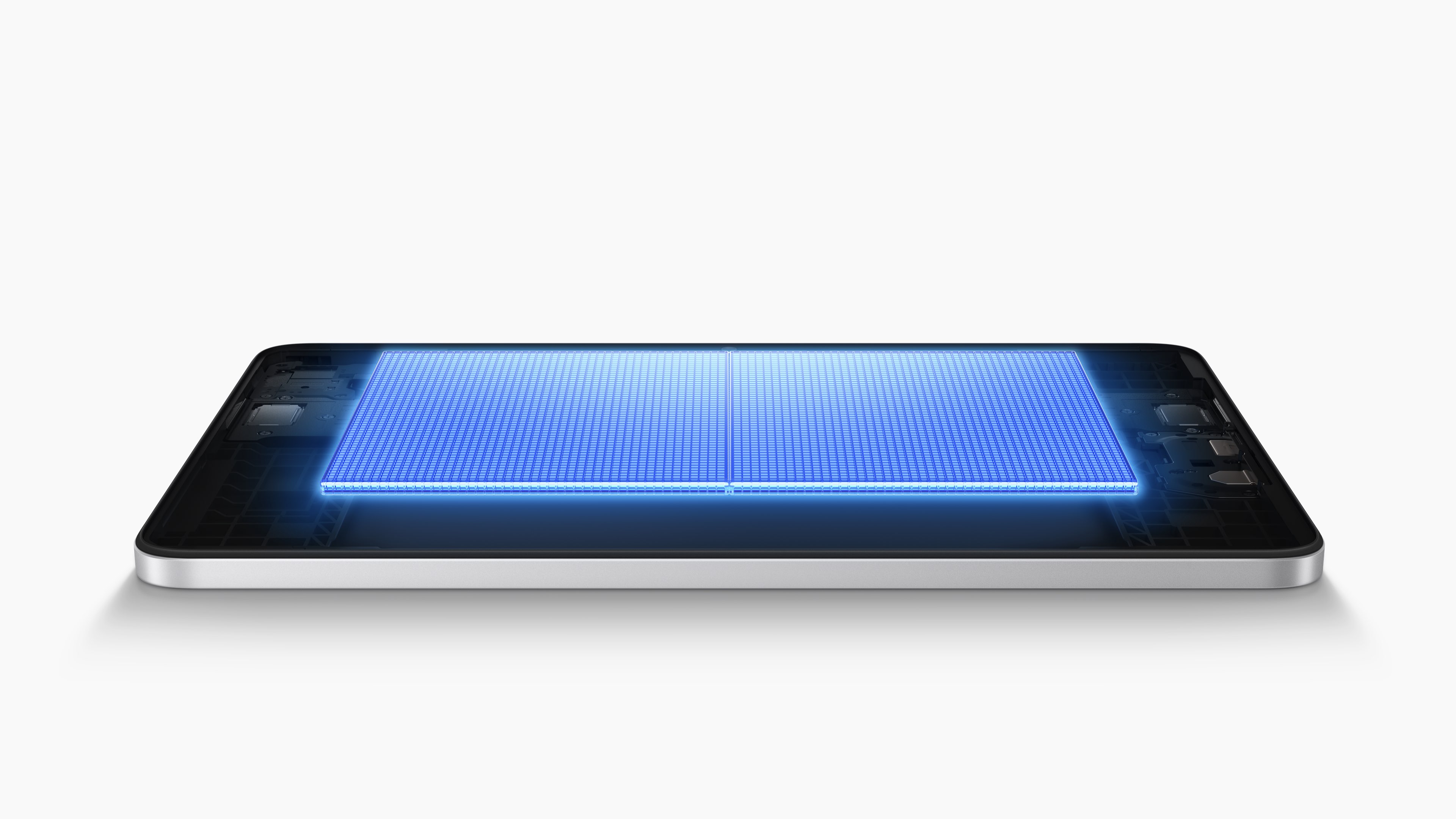 A blue glowing electronic component is located at the top of the device, with a white background showing the internal structure of the device.