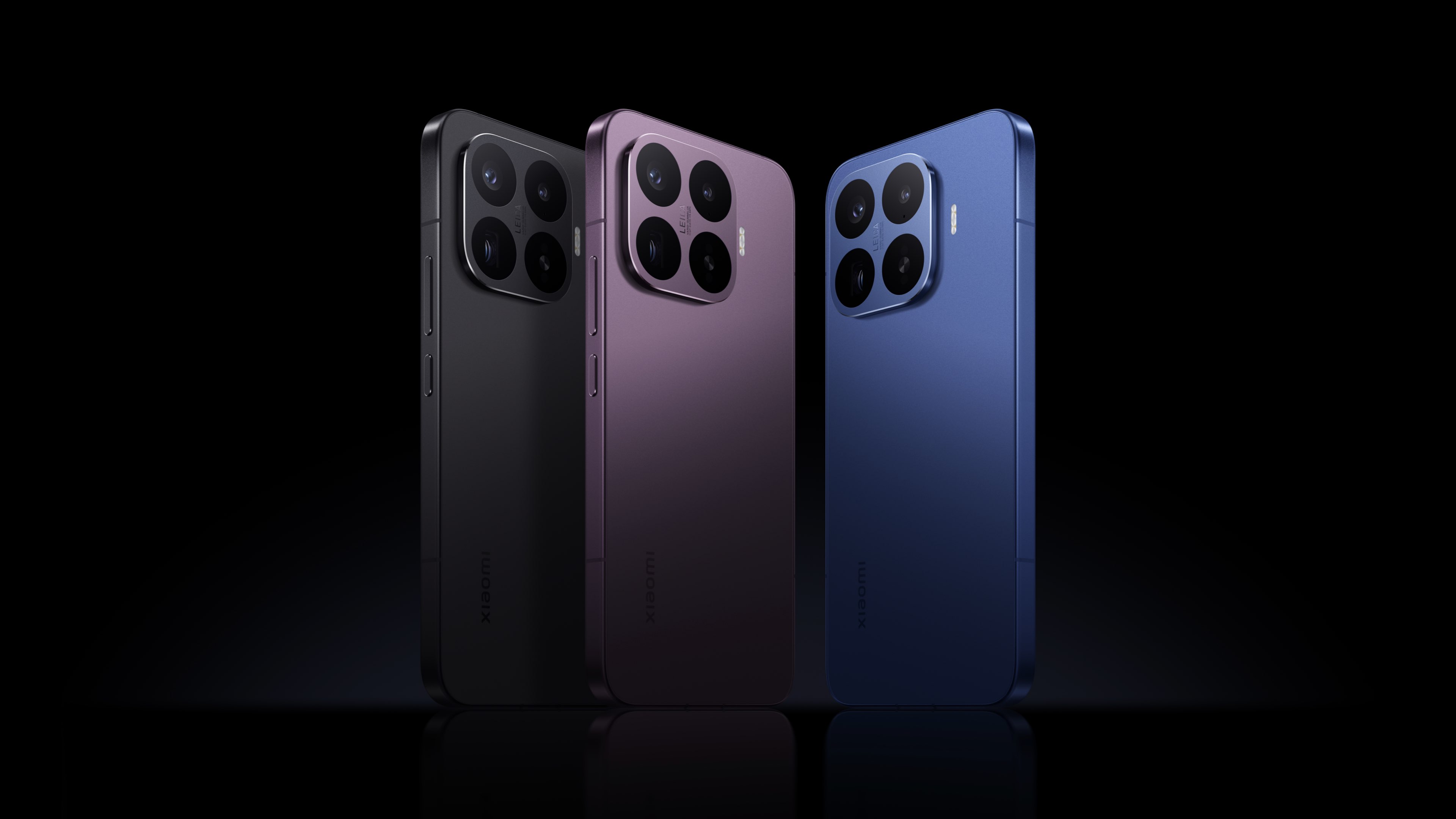 Three smartphones are arranged against a black background, in black, purple, and blue, with the camera module visible on the back, featuring a simple and modern design.
