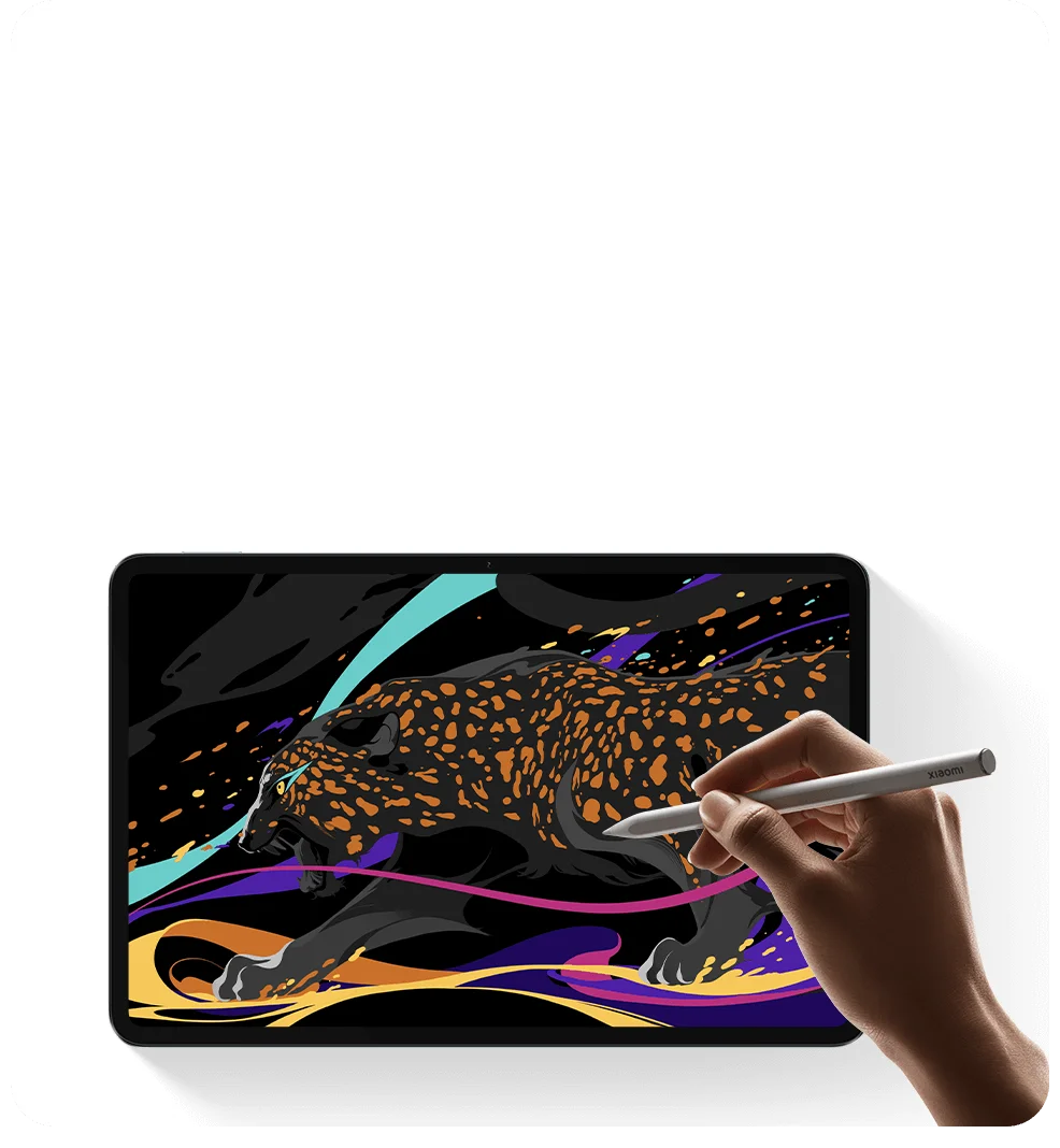 Um Xiaomi Pad 6 cercado por vários dispositivos eletrônicos e cabos em uma mesa moderna e elegante